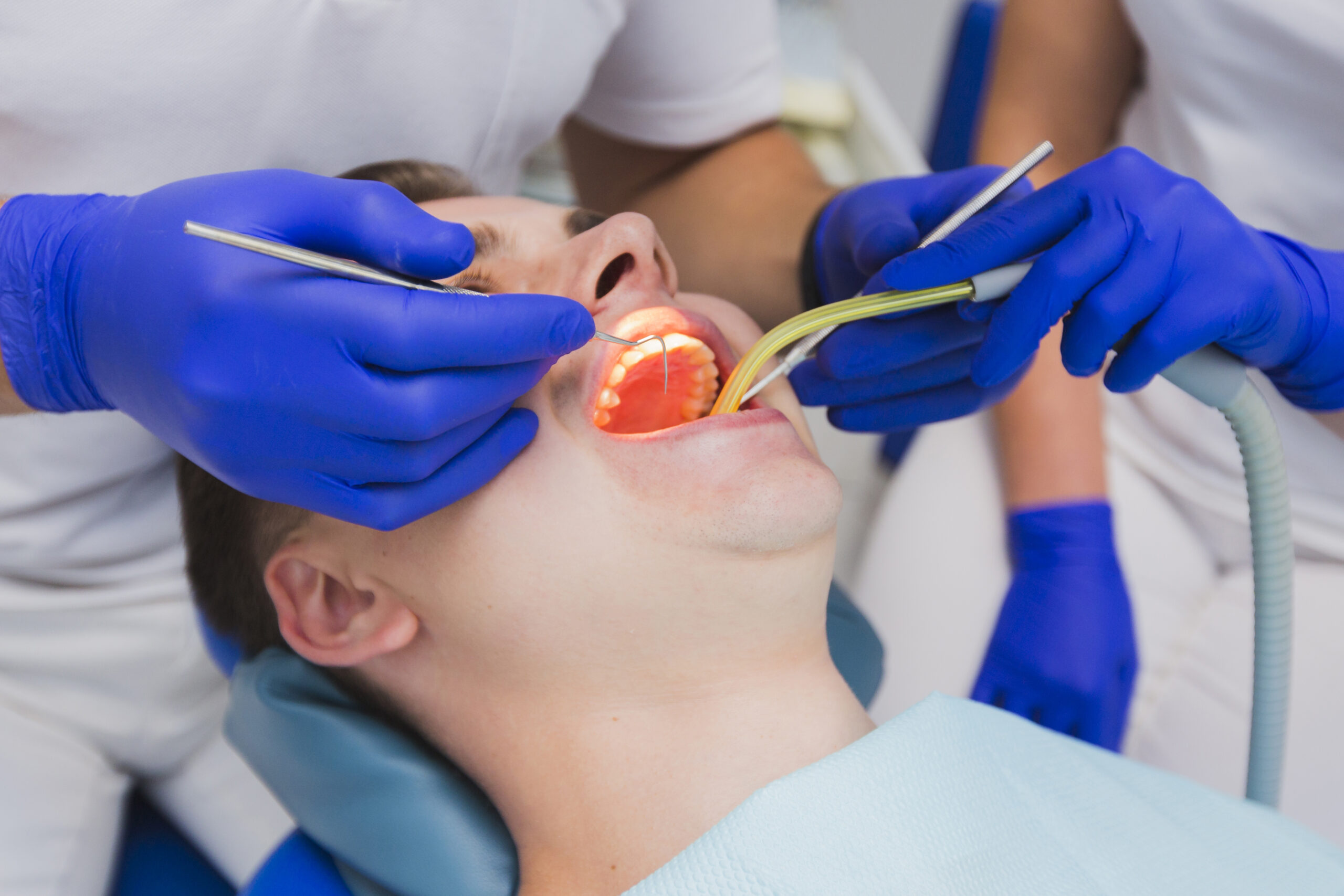 https://dental.netizens.dev/wp-content/uploads/2025/05/close-up-dental-procedure-patient-scaled-1.jpg